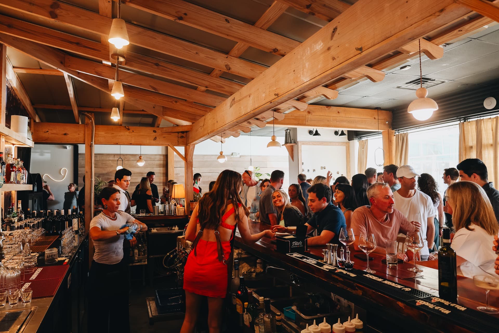 Guests enjoying a lively evening at the Mamasamas bar